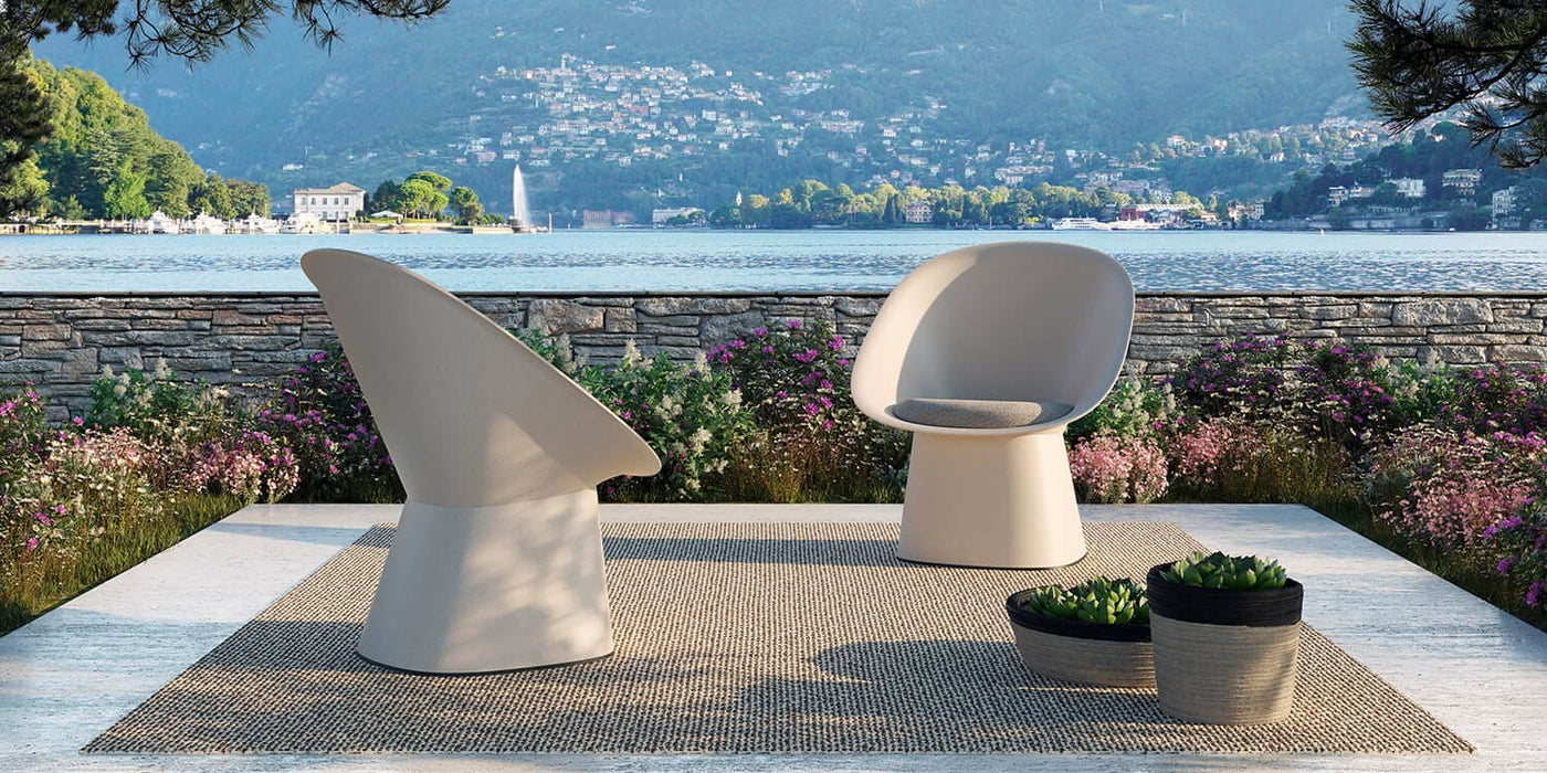 Sensu chair by TOOU: Eco-friendly, fan-shaped for indoor/outdoor use, merging comfort with Japanese-inspired elegance.