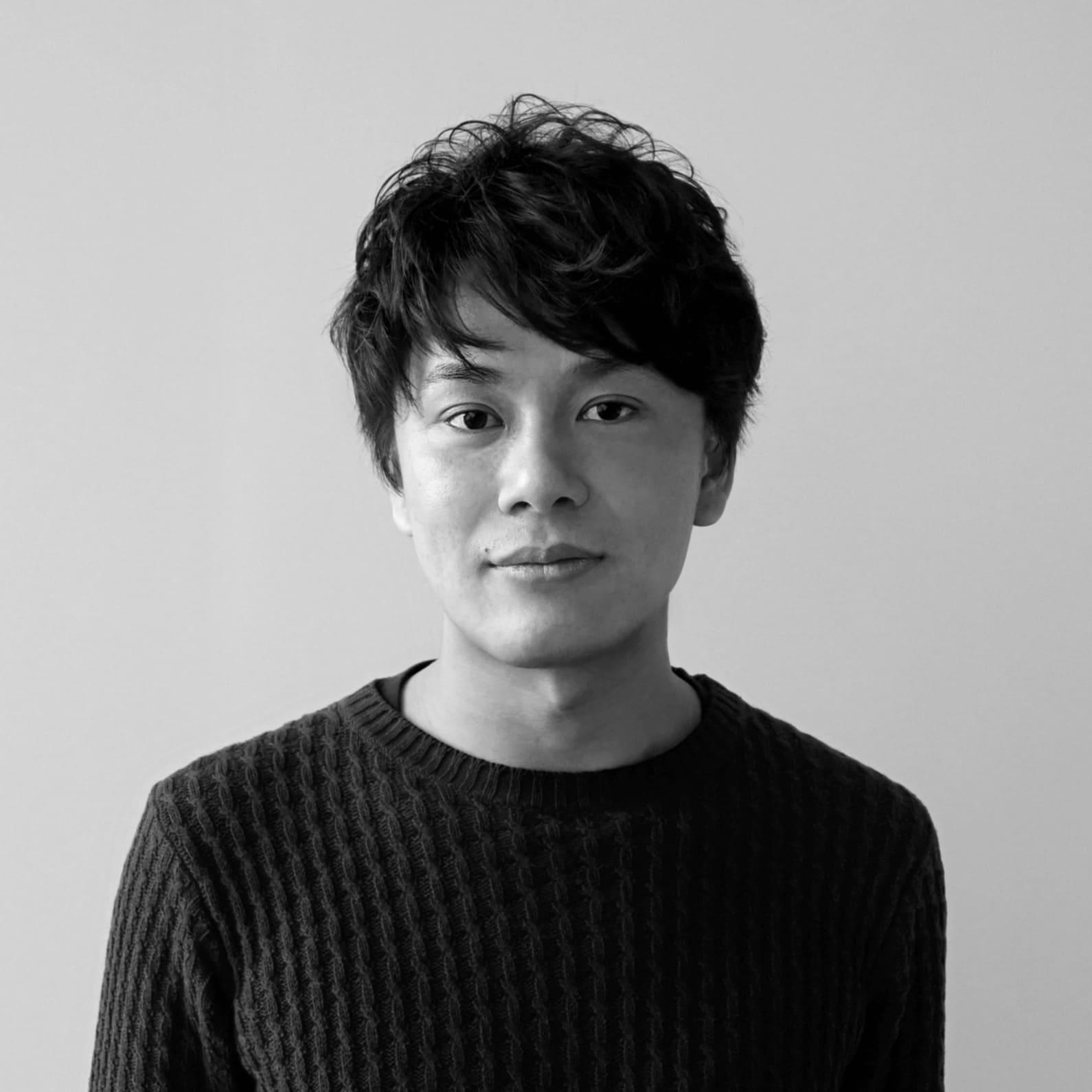 Yokozeki Ryota, Japanese designer, blending traditional craftsmanship with modern industrial design to create aesthetic and functional furniture.