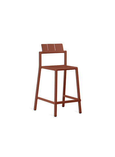 YARD Counter Stool in rust red by TOOU Design, a lightweight and stackable seating solution for modern indoor and outdoor use.