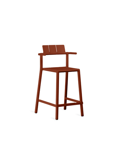 YARD Counter Stool with arms in rust red by TOOU Design, a stylish and stackable seating option for indoor and outdoor use.