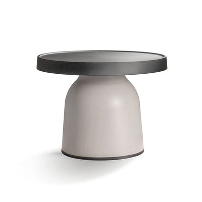 The Thick Top side table by TOOU Design is the perfect blend of form and function. With two different heights, it's a versatile and flexible object suitable for any room or public space, and the eco plastic base is made of recycled organic waste materials with an extremely low environmental impact.